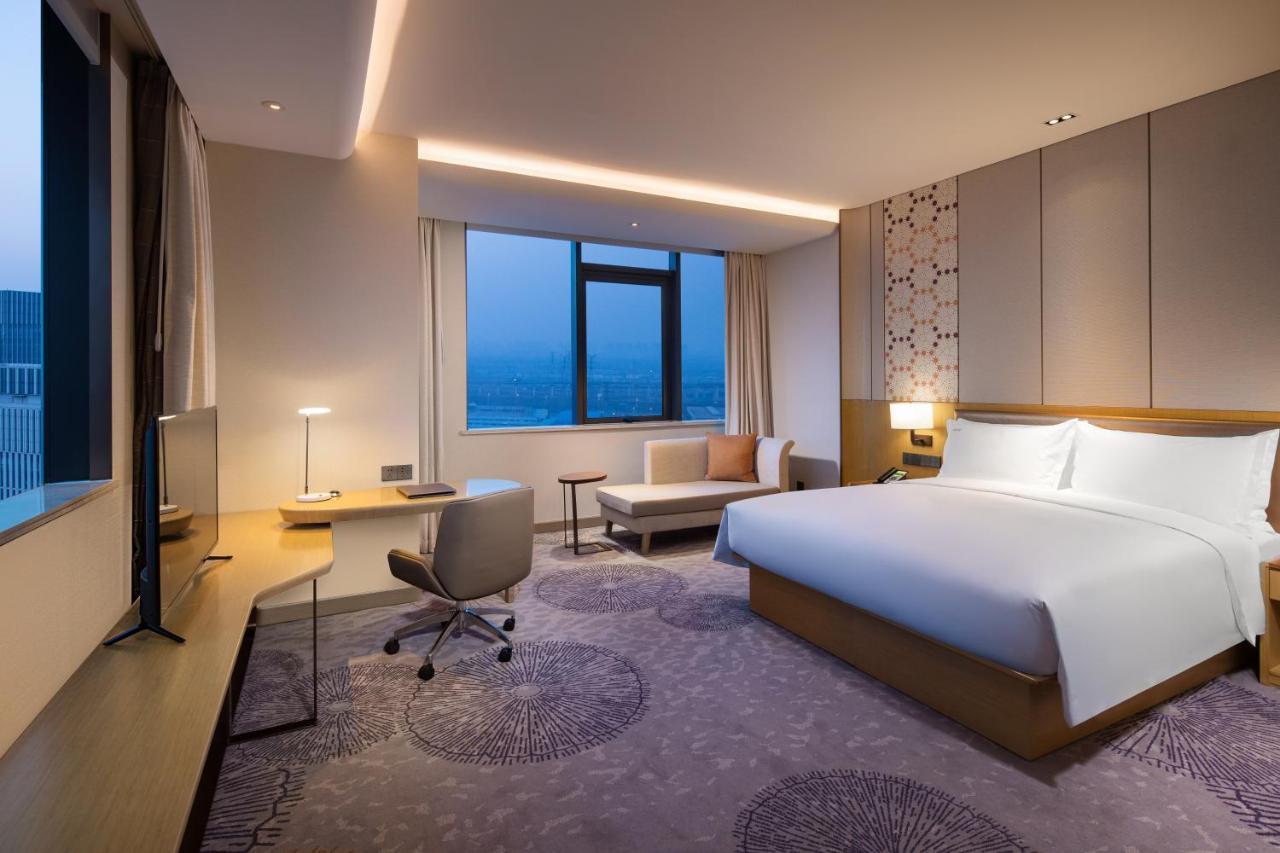 Holiday Inn Tianjin Xiqing By Ihg Buitenkant foto