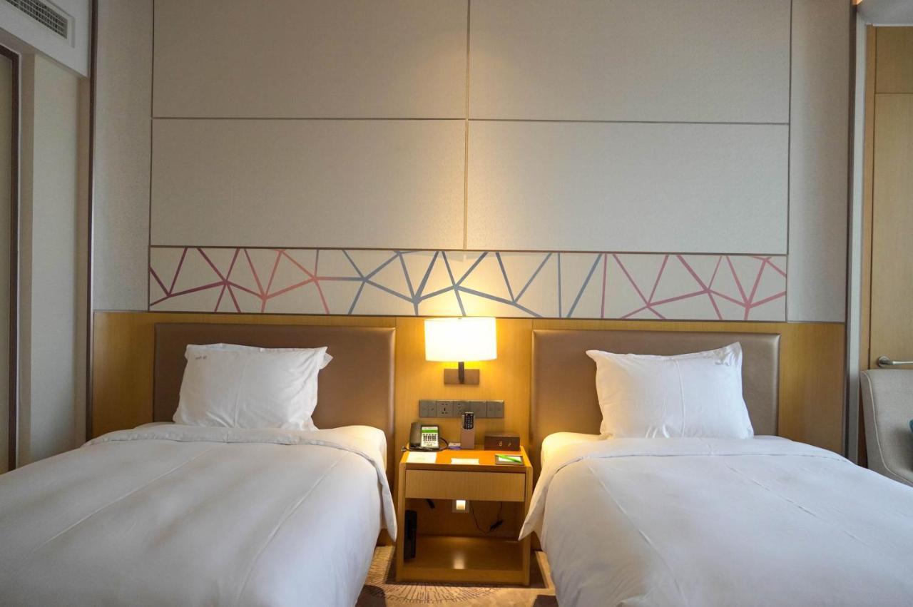 Holiday Inn Tianjin Xiqing By Ihg Buitenkant foto